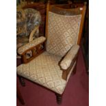 An Edwardian walnut and floral upholstered parlour suite comprising;