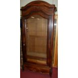 A late 19th century French rosewood armoire, having later inset glazed door above a blind base