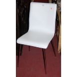 A set of four contemporary white vinyl upholstered and chrome framed kitchen chairs