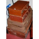 Three various leather cases and a canvas bound rexine suitcase (4)