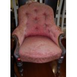 A Victorian mahogany framed and pink floral buttonback upholstered showframe armchair  Condition