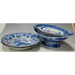 A pair of 19th century Kaolin china blue and white printed soup bowls;