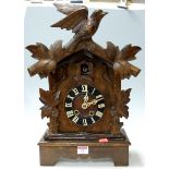 A continental beechwood cuckoo clock