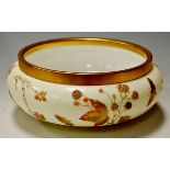 A Wedgwood porcelain fruit bowl with gilded metal mount,