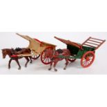 Britains, 2 unboxed tumbrel carts, one pre-war rare cream with red wheels,