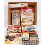 8 assorted 1/25th scale plastic kits by Revell, AMT and Jo-Han, all racing car,