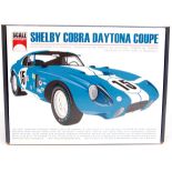 Scale Motorsport 1/24th scale white metal and resin kit for a Shelby Cobra Daytona Coupe,