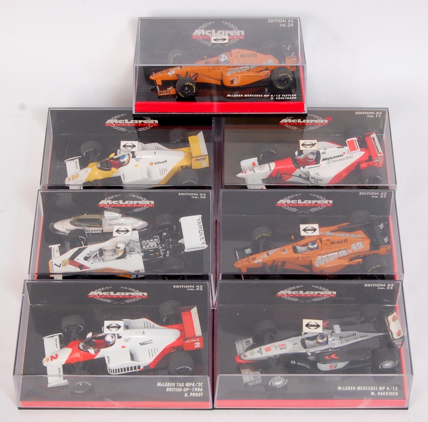 Minichamps 1/43rd scale Mclaren Mercedes Formula 1 Group, 7 plastic cased examples,