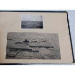 An album of WW II photgraphs and ephemera to include German Kriegsmarine examples.
