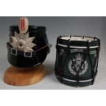 A reproduction German Berlin police shako, together with a Regimental Replicas Military drum ice