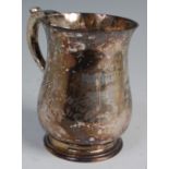 A mid-20th century silver bell shaped tankard, bearing a presentation inscription "To LIEUT.