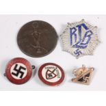 An NSDAP Nazi party enamelled lapel badge, together with four various badges.