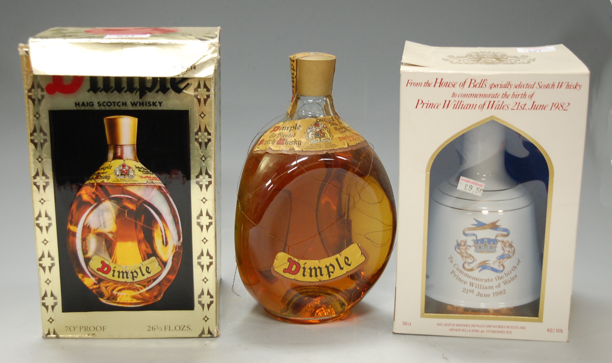 Dimple Haig scotch whisky, two bottles; and a Bell's celebration scotch whisky,