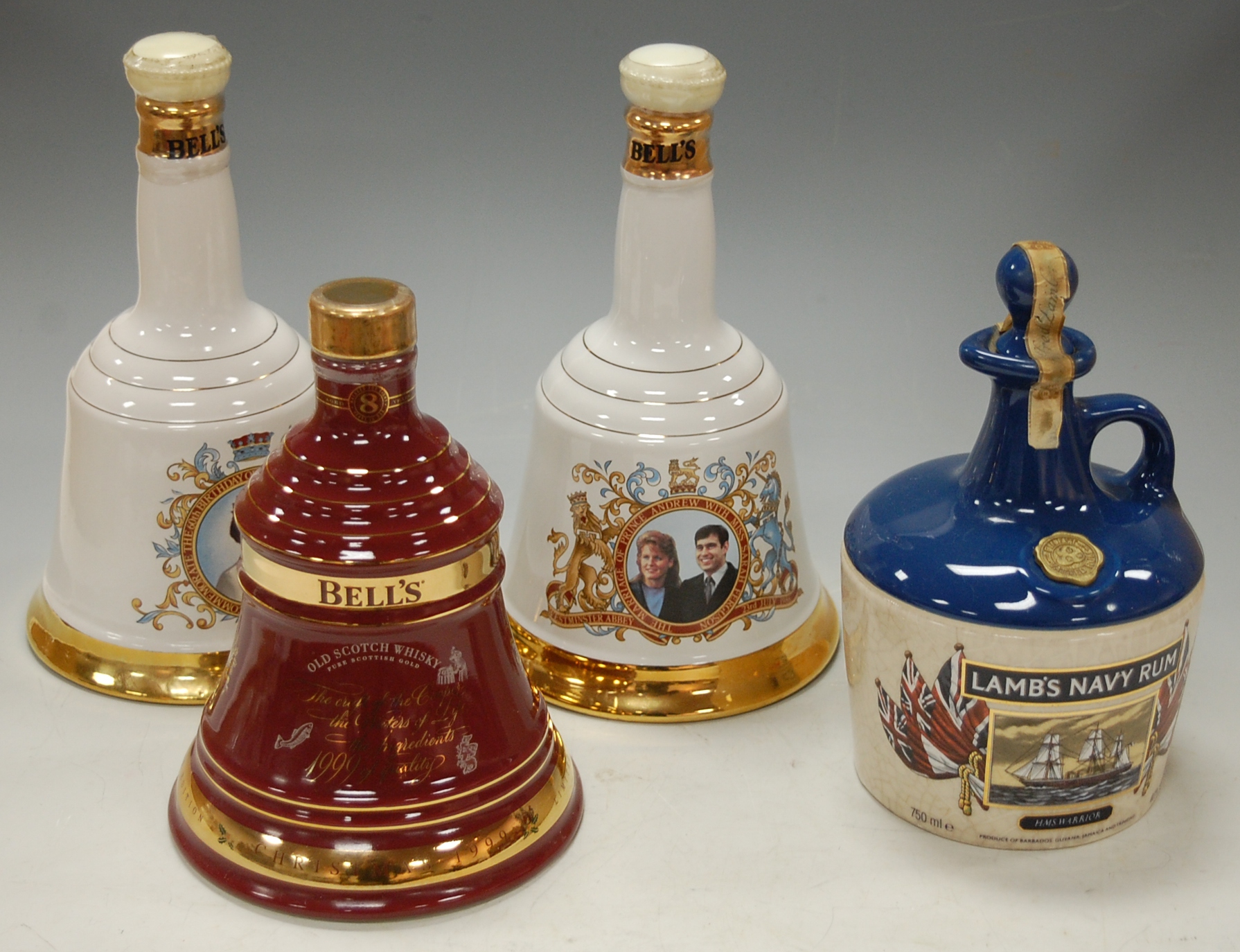 Six various Bell's commemorative scotch whisky decanters, each 70cl and one other 50cl example,