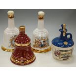 Six various Bell's commemorative scotch whisky decanters, each 70cl and one other 50cl example,