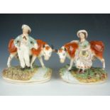 A pair of 19th Century Staffordshire figurines, modelled respectively as a milk maid and a cow