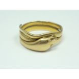 An 18ct gold ring in the form of a coiled serpent, 7.1g