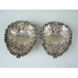 A pair of Victorian silver pin dishes, each having raised ribbon and reticulated decoration, James