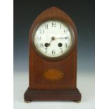 A late 19th Century inlaid mahogany mantle clock, having two-train movement by the Hamburg America