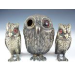 An early 20th Century electroplate novelty owl condiment set, comprising owlet mustard,