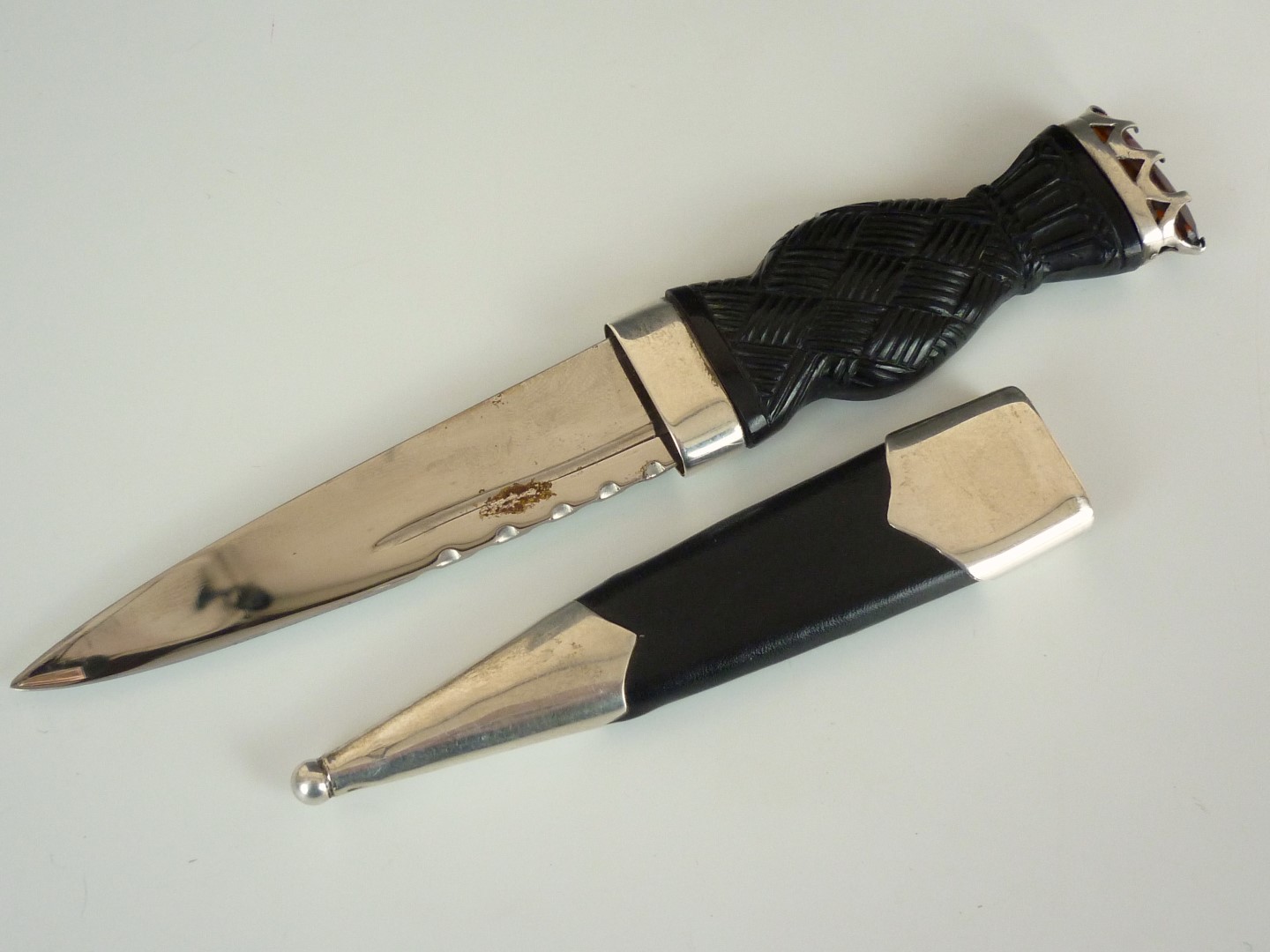 A silver-mounted Scottish sgian dubh, with citrine coloured stone claw-set to the pommel, late