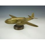 A Second World War period brass stylized model of a two-engined bomber