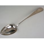 A late 18th Century Old English pattern silver ladle, with bright cut foliate engraving to the