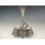 A Victorian EPBM desk stand with epergne, the cruciform platform base supporting a pair of cut glass