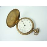 A late 19th / early 20tH Century Elgin rolled-gold pocket watch in fancy hunter case, (a/f)