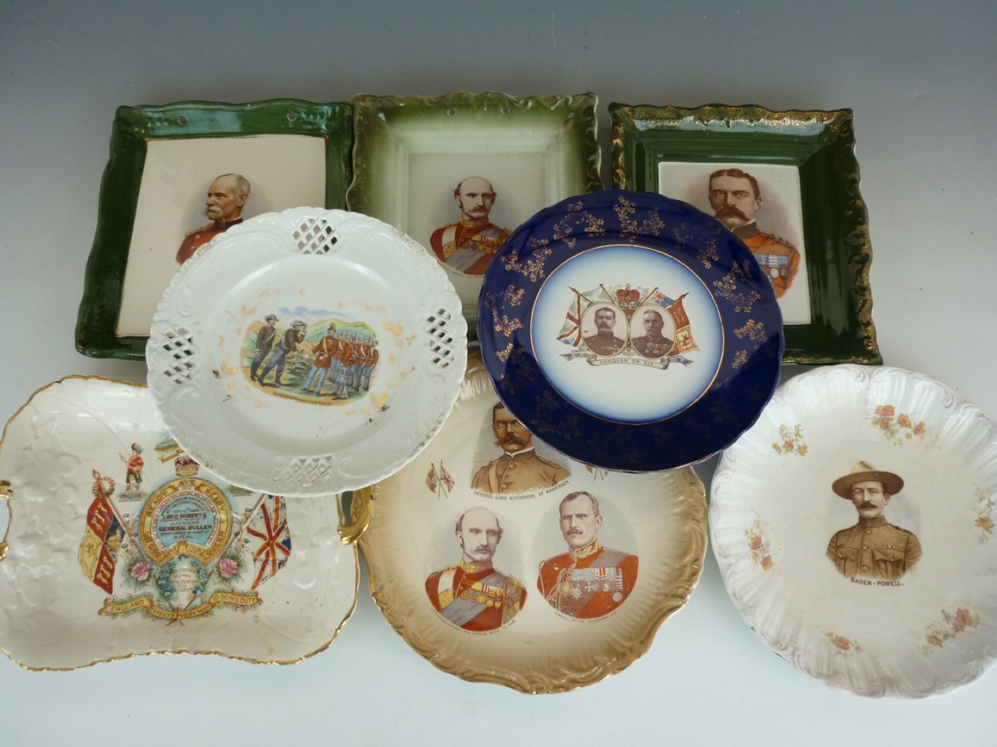 8 various Boer War period ceramic patriotic and military themed plaques and dishes