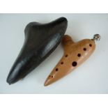 A cased Victorian earthenware and electroplate ocarina by Ercole Mezzetti of Paris