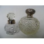 An early 20th Century silver-mounted cut glass perfume bottle of grenade from, together with a