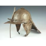 An old reproduction English Civil War harquebusier's helmet, together with a pikeman’s pott