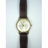 A 1960s Longines 9ct gold wrist watch, having a calibre 280 manual wind movement, radially brushed