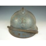 A First World War French 1915 Adrian pattern steel helmet