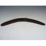 An antique Australian aboriginal boomerang, 60 cm