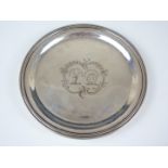 A 19th Century electroplate dish, of circular section with moulded and reeded rim, bearing an