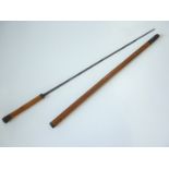 A 19th Century sword stick, of malacca cane with single-fullered blade, 89 cm, blade 69 cm