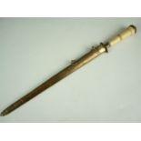 A Georgian ivory handled dirk, having a blue-and-gilt blade, single-fullered and decorated in a