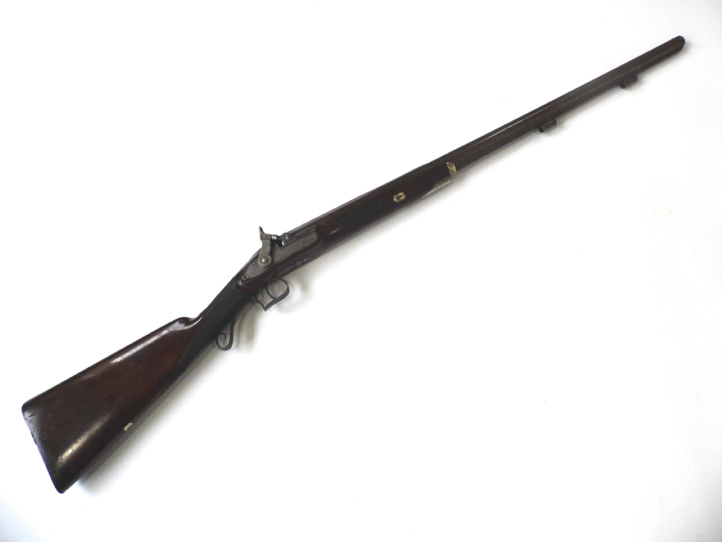 An early percussion fowling piece by W Walkling, having 32" 8-bore twist barrel, octagonal at the