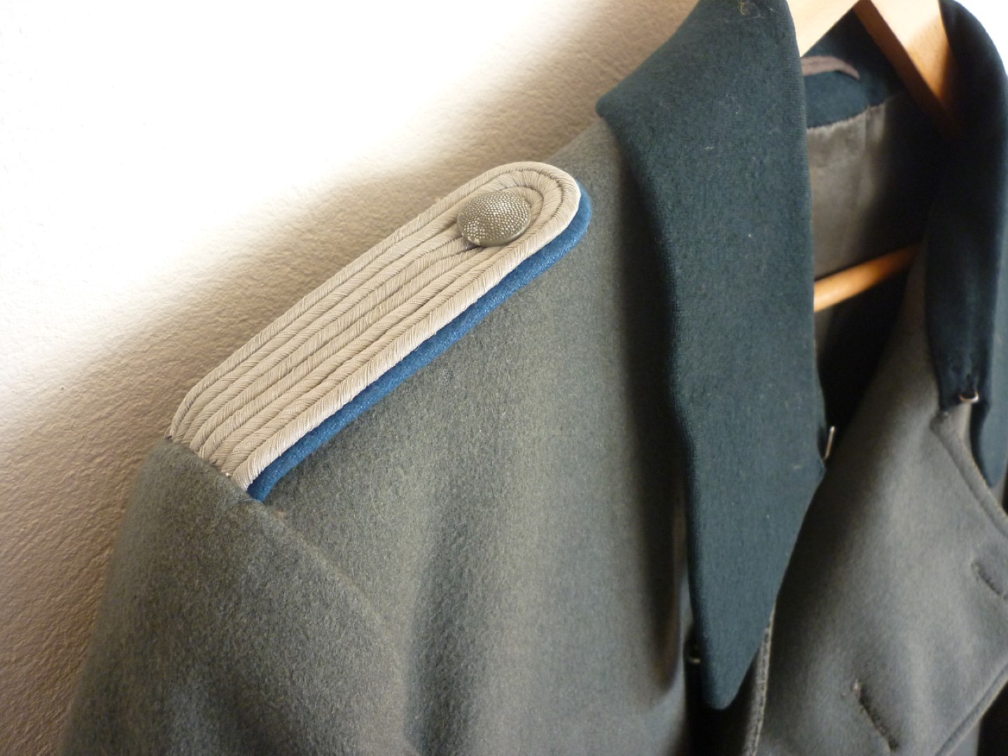 A Second World War German army officer's greatcoat with blue waffenfarbe - Image 2 of 2