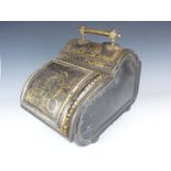 A Victorian toleware coal scuttle, of flamboyant curvilinear section with decorative cast brass