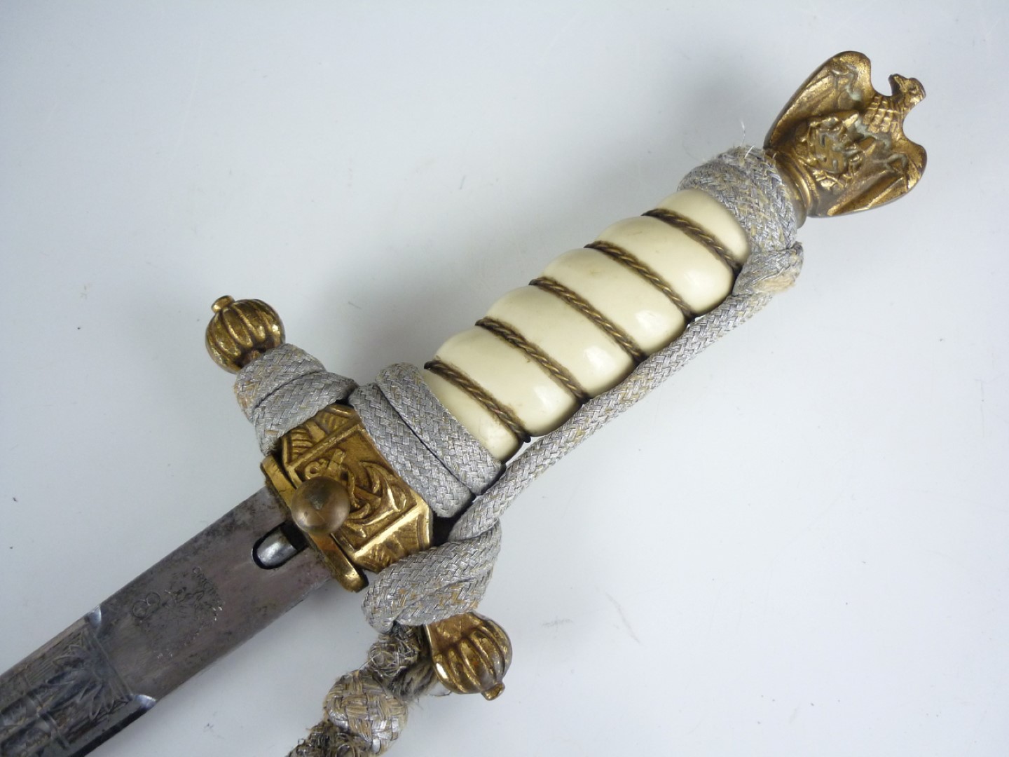 A Second World War German Kriegsmarine officer's dagger by Eikhorn, with portepee and hanging - Image 3 of 4