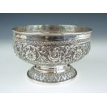 A 19th Century Anglo-Indian white metal bowl, of circular section on low moulded foot, the bowl