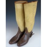 A pair of early 20th century riding or officer's field boots, with canvas uppers