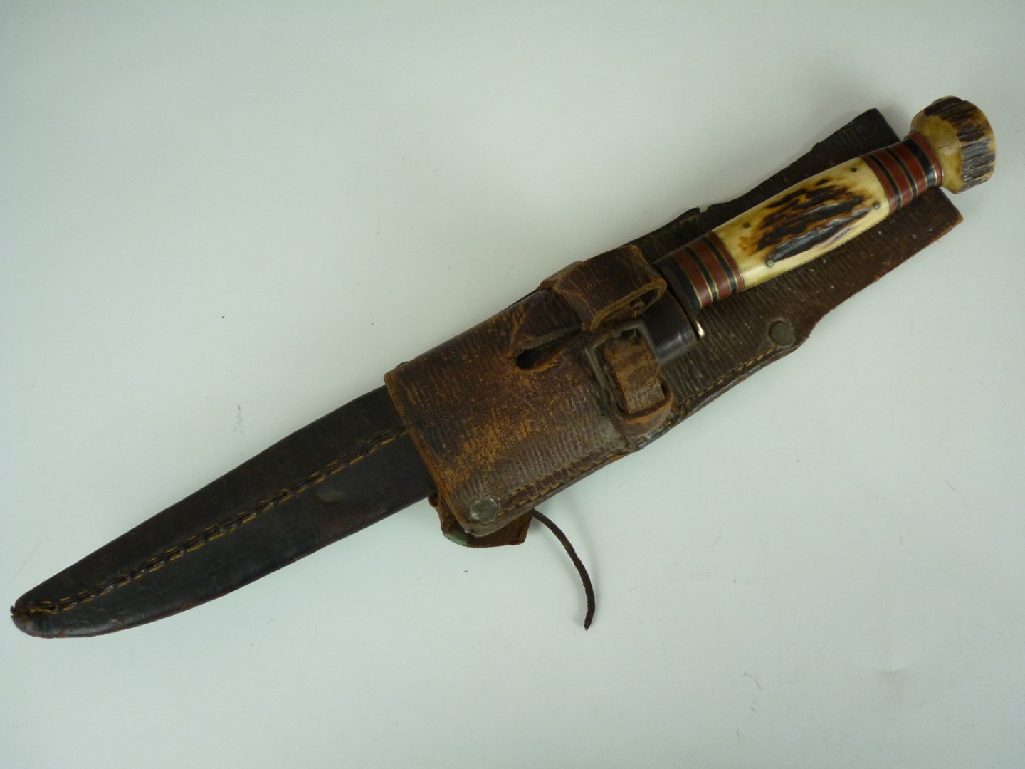 A hunting knife by G Wostenholm of Sheffield, in leather scabbard with Pattern 1914 bayonet frog - Image 2 of 2