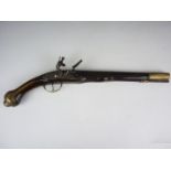 A mid 18th Century Continental flintlock holster pistol, having 12" barrel, octagonal at the breech,