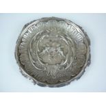 A 19th Century silver Rococo Revival dish, of circular section with shaped rim, having chased and