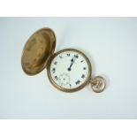 A 9ct gold cased Waltham hunter pocket watch, having crown wound lever movement, white enamelled