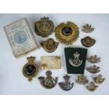 A group of Durham Light Infantry insignia including officer's and other-rank's glengarry badges,